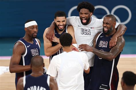 Jayson Tatum plays limited minutes as USA wins gold .